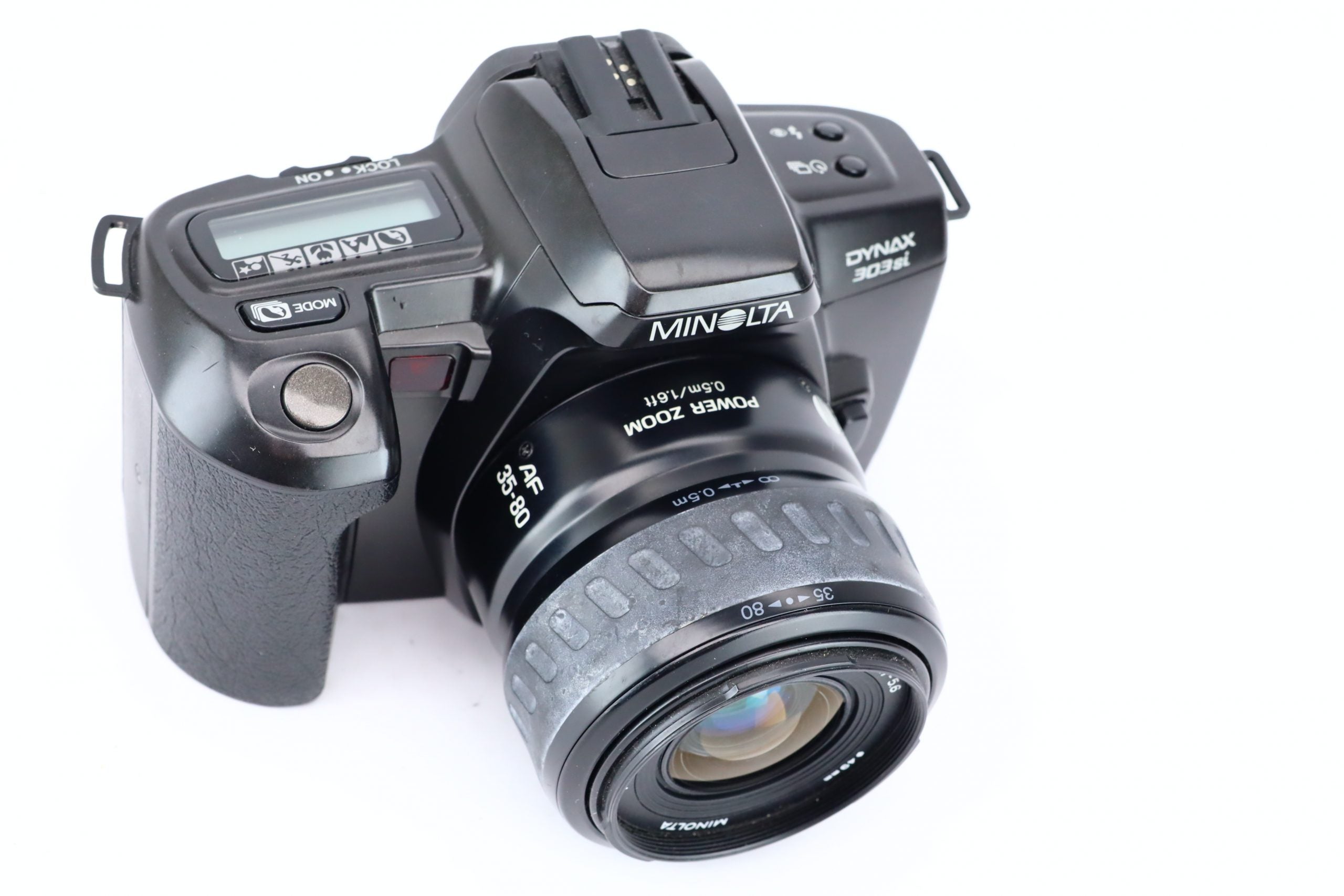 Minolta offers 303si Super SLR 35mm Film Camera With Minolta lens