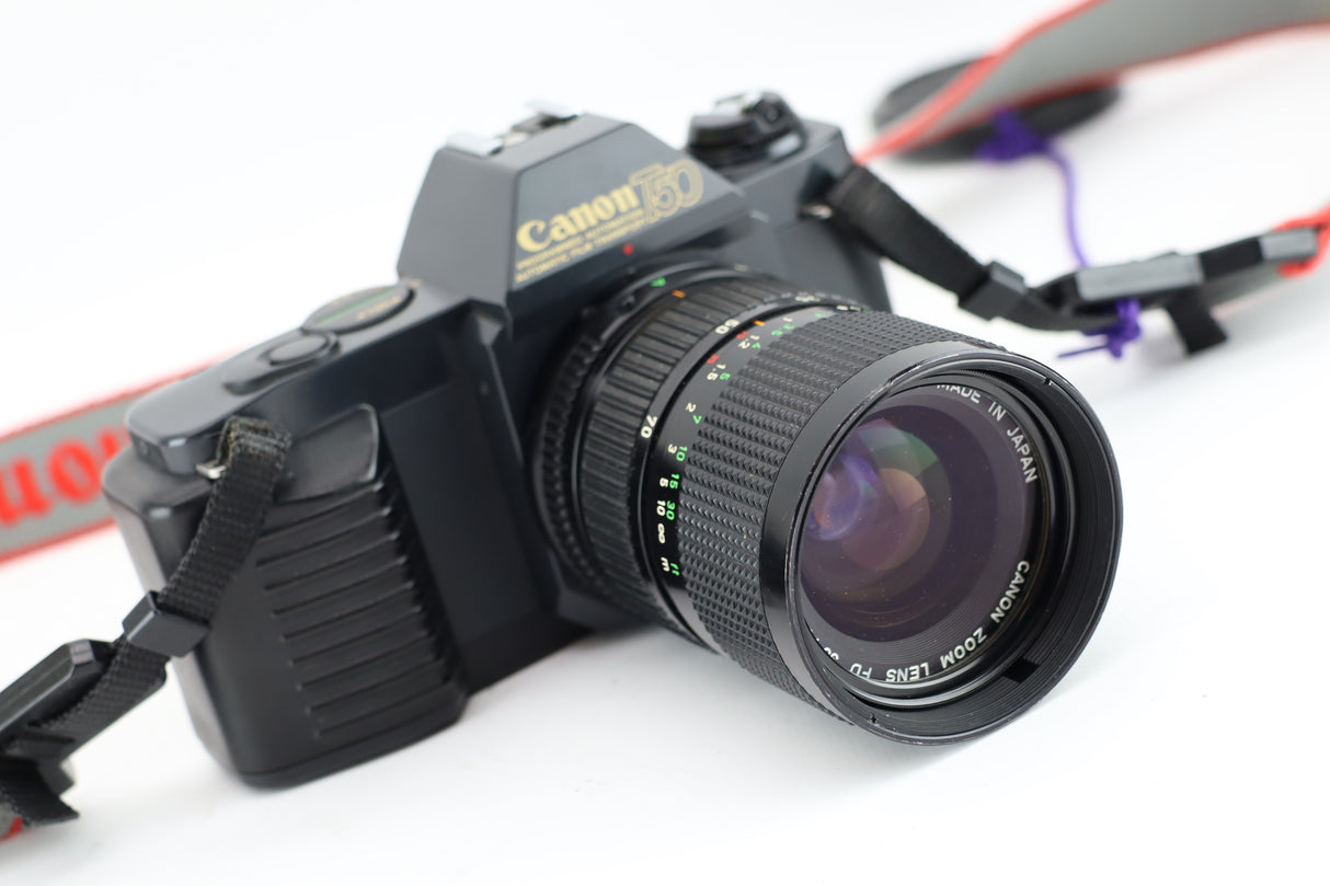 Canon T50 + FD 35-70mm 4