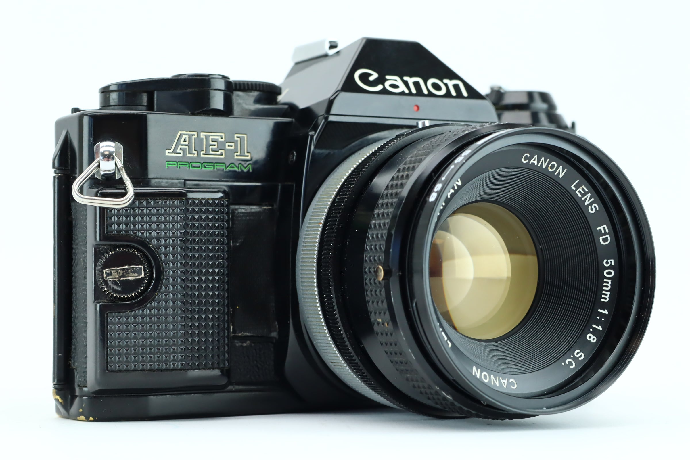 Canon AE-1 Program + FD 50mm 1,8 – Hard to Find Camera Store